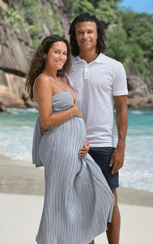 Kaylee Ramman with her baby bump and husband, Nathan Ake.